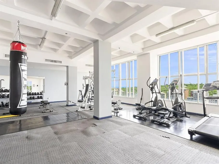 Апартаменты Luxury Lagoon-View Condo Steps To Beach Cupecoy